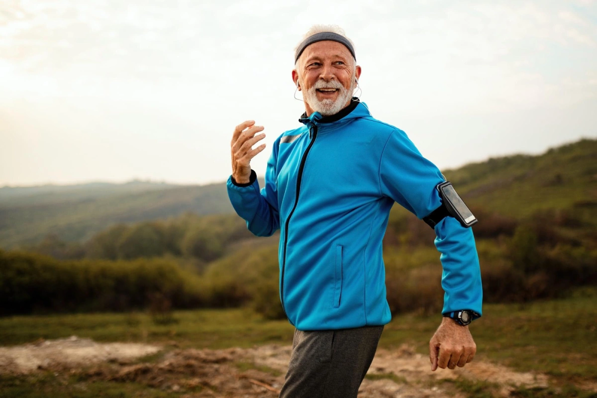 happy-senior-runner-jogging-nature-enjoying-healthy-lifestyle_637285-3944
