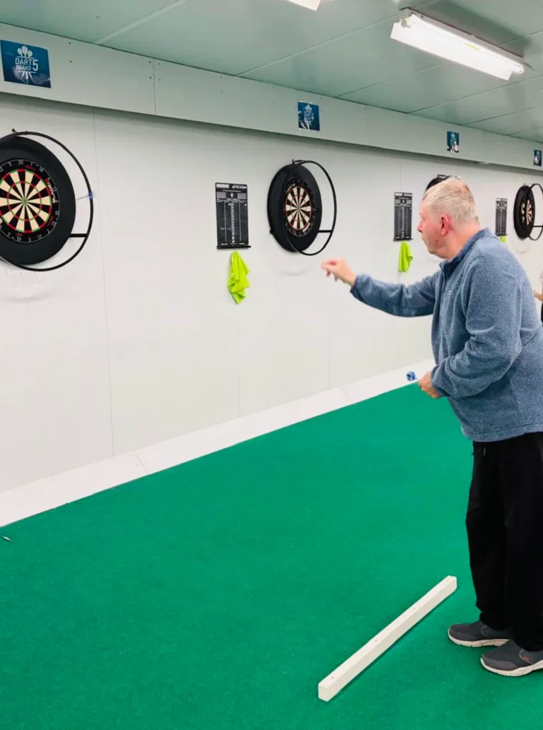 David playing darts